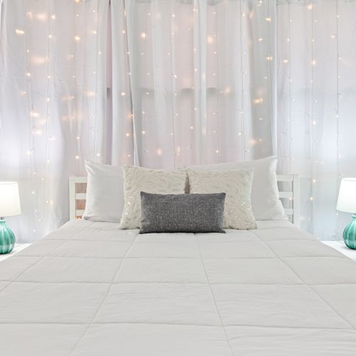 Escape into the embrace of this cozy bedroom.