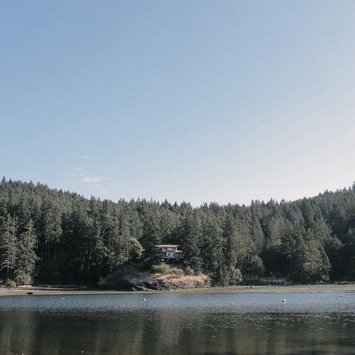 Grindstone Harbor with home  overlooking the water.