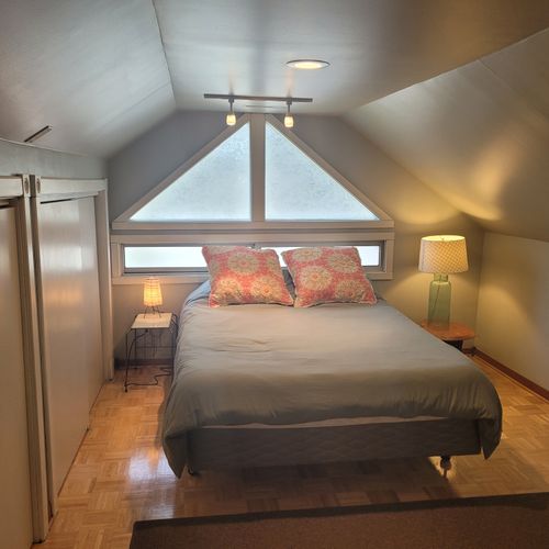 Bedroom #2 ( second floor):  very cute and fun bedroom with a queen-size bed, chair, lots of closet space and its own en suite full bathroom.