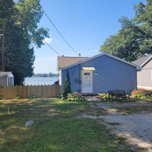 Exterior:  the front of the cottage in summer.