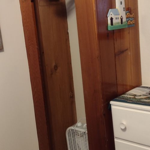 Bedroom #1:  features a full-size bed, nightstand, lamp, dresser. And closet.