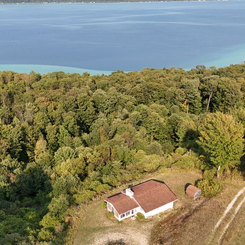 Exterior:  another aerial view with crystal lake in the background.