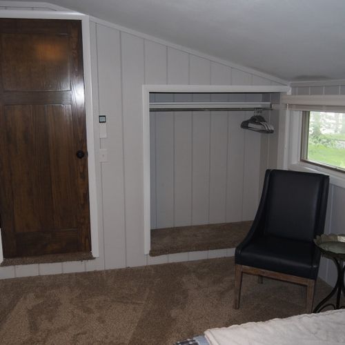 Bedroom #3 (second floor):  cute little bedroom with a full-size bed and it's own private a/c unit.