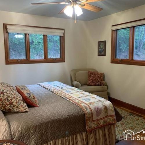 Adjacent to bedroom 1 is bedroom 2, which also features a cozy king-sized bed and plenty of closet space. This bedroom is ideal for couples or individuals who want their own private sanctuary while still being in close proximity to the rest of the group.