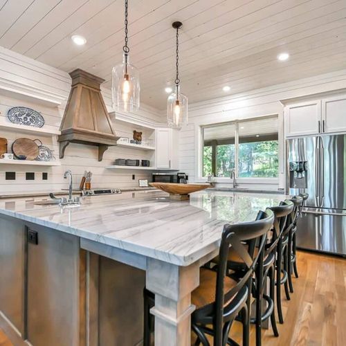 The kitchen provides extra seating at the island.