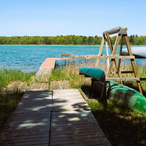 Exterior:  the private dock along with the 2 kayaks and a canoe that are available for guests to use.