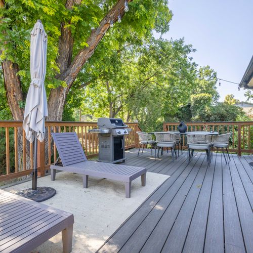 Perfect your grilling game at this stylish, host-ready outdoor setup.