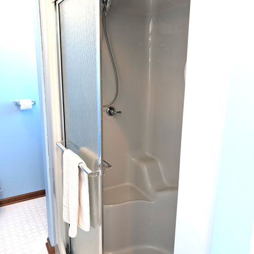 BATHROOM #2 (SECOND FLOOR):  This is a large private ensuite full bathroom for Bedroom #2.  Features a gorgeous jetted bathtub with a great view of Big Platte Lake from the bathtub!