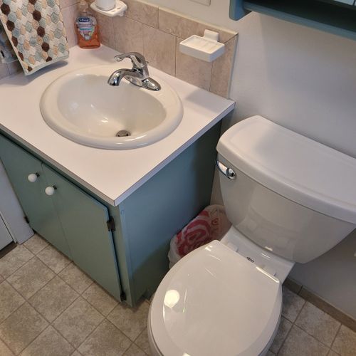 Bathroom #1:  full bathroom with a combination tub and shower.