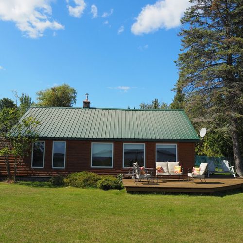 Overall:  the backyard of the house, which faces the lake.