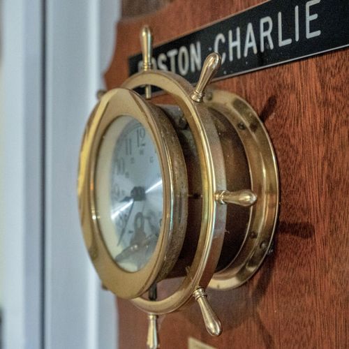 Stunning maritime porthole mirror — a nod to the city's portside heritage.