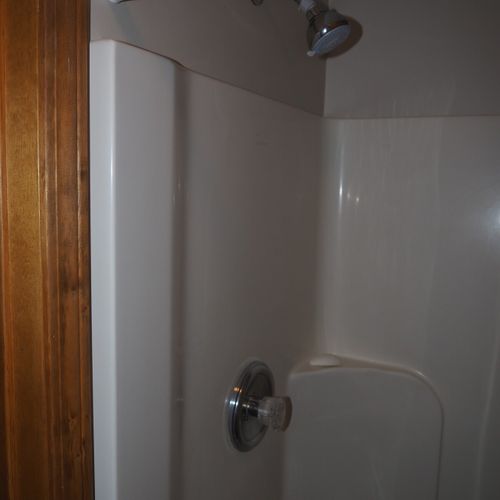 Bathroom #2 (main floor):  there is a convenient half-bath with a shower, toilet, and mirror at the back of the laundry room on the main floor.
