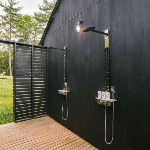 Outdoor shower off the Pool House conveniently located near the hot tub and pool