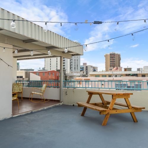 Modern, spacious balcony with breathtaking cityscape views.