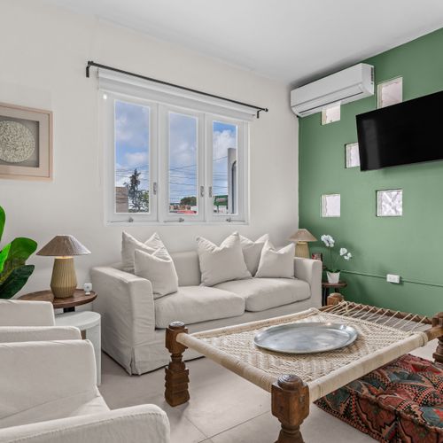 Spacious, bright living area for lounging and socializing.