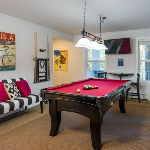 The pool room is the place for fun.  A full-sized pool table plus puzzles and games make this the perfect hangout!
