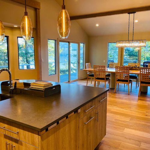 The kitchen island provides plenty of work space for meals and seating for four.
