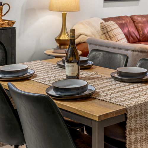 Thoughtful touches make this dining space perfect for everything from morning coffee to family dinners.