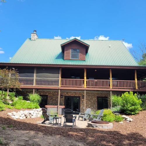 Exterior:  the back of the cabin in summer.
