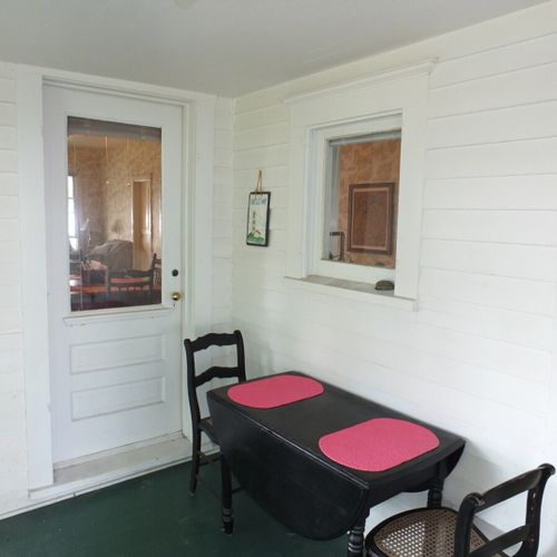 Porch:  the cottage has a huge wrap-around porch that is fully enclosed and has great views of crystal lake!