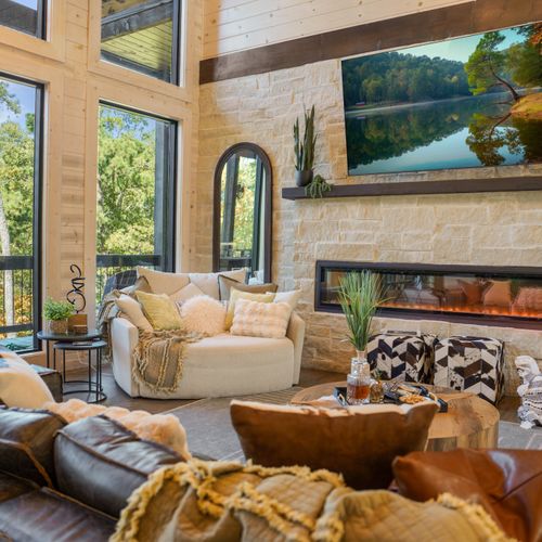 Warm wood, rich fabrics, and panoramic forest views—this is comfort elevated.