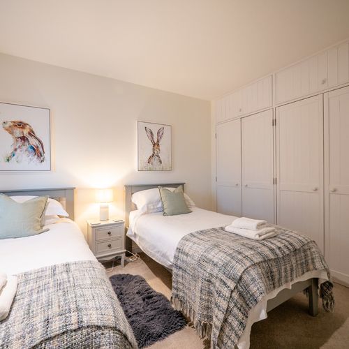 Twin bedroom on lower level.