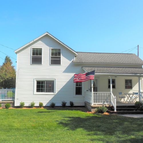 Exterior:  the front of the house in summer.