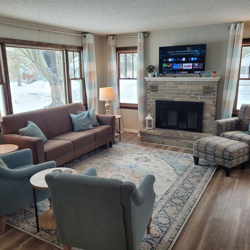 Overall:  the very cute and cozy living room. Note that the indoor wood fireplace is not to be used by guests as it is unsafe to use!
