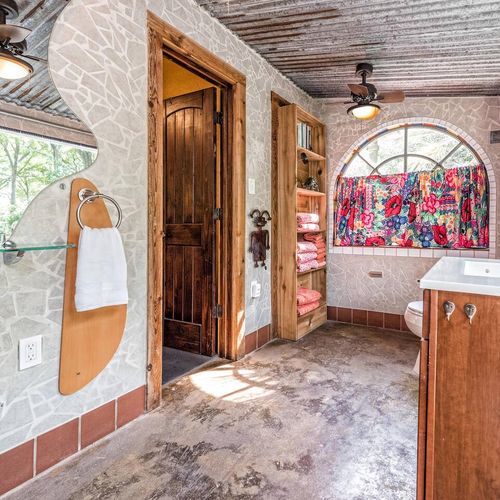 Full size bathroom with a walk in shower