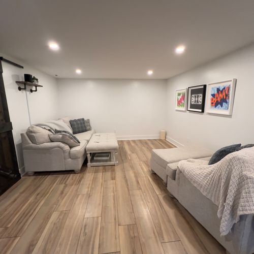 The projector in this media room makes for a perfect, chill hang.