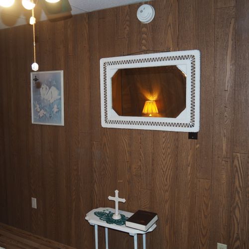 Bedroom:  includes a queen-size bed, dressers, night lamps, ceiling fan, closet, and room a/c unit.