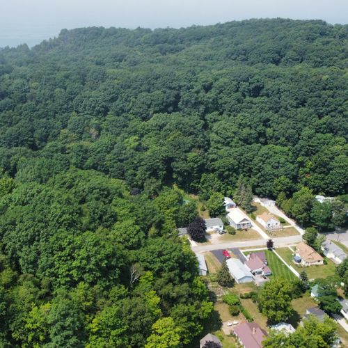 Exterior:  an aerial photo showing the house, the elberta dunes, and lake michigan in the background