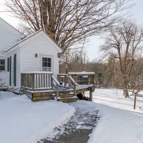 Walkway to the mudroom entry of the home.