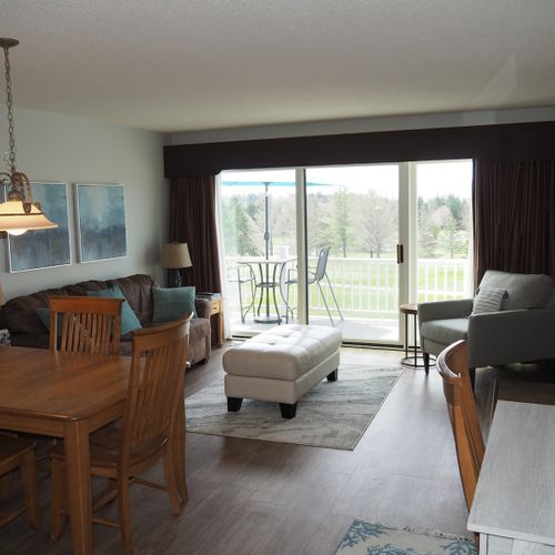 Living room:  features a sofa, comfy chair, ottoman, large screen television, and a desk and chair. (note that guest usage of the fireplace in the living room is strictly prohibited. )