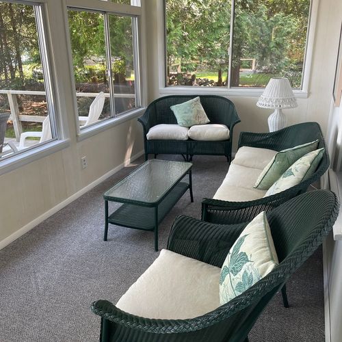 Porch:  the cottage has a beautiful enclosed porch with comfy seating and great views of the lake!