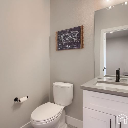 A powder room completes this floor for easy access.