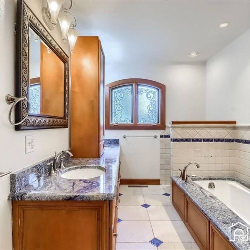 The home features two large and upgraded bathrooms on each floor, stocked with essentials for your convenience.