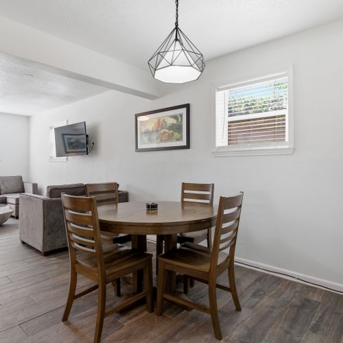 Inviting dining area w/ natural light & space for the whole group