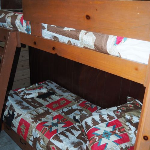 Bedroom #3:  features a twin-on-twin bunk bed and a dresser.