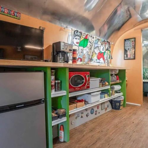 The kitchen comes equipped with all the basics for a quick meal in the Airstream