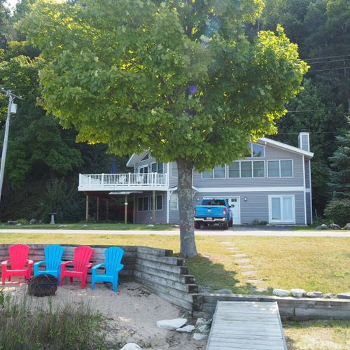 Exterior:  the private bonfire ring with the house behind it.