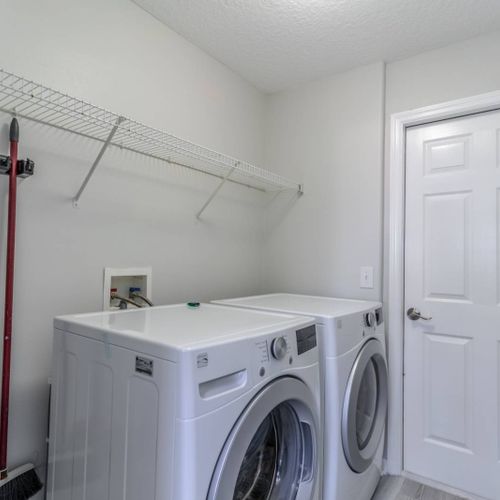 Laundry Area w/Full Size Washer & Dryer