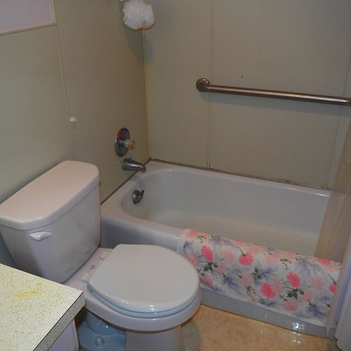 Bathroom:  full bathroom with a combination tub and shower.