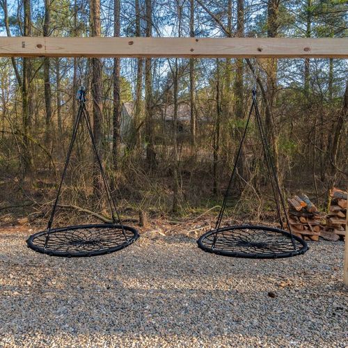 2 swings in the back yard!