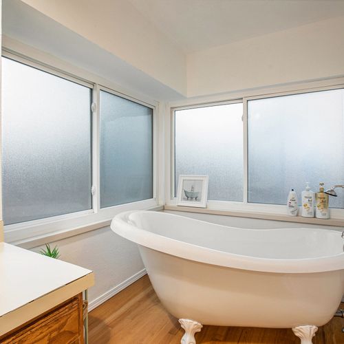 Soak your troubles away in the deep tubs of this home's well-appointed master bath.