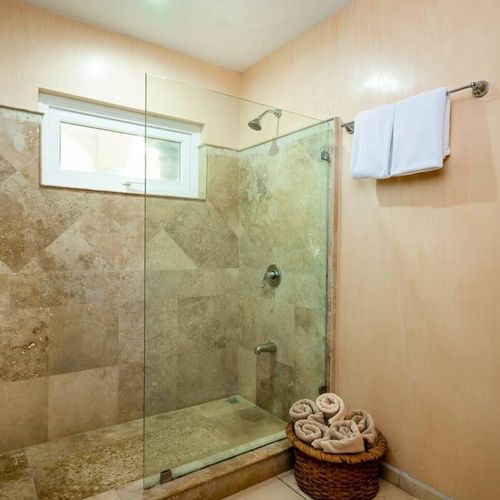 The seocnd bathroom offers a shower