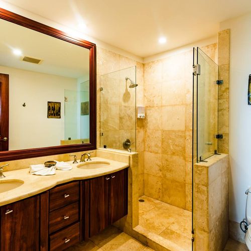 This bathroom come with two sinks.