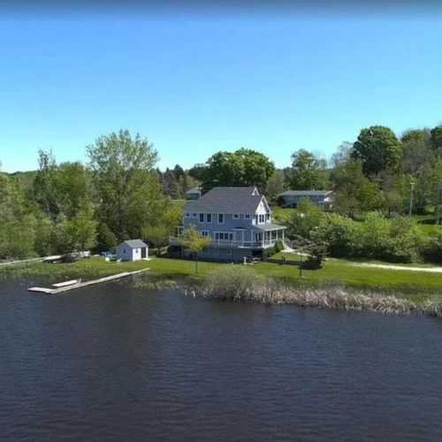 Exterior:  a great aerial photo of the house from up above betsie lake.