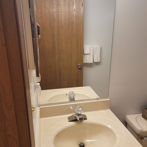 Bathroom #2:  common full bathroom with a combination tub and shower.