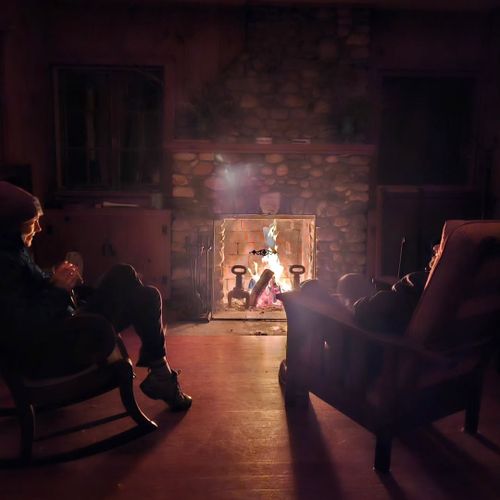 Living room:  the fireplace being used at night